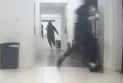Armed masked men raid a house north of Toronto, beat its residents and hold them hostage.