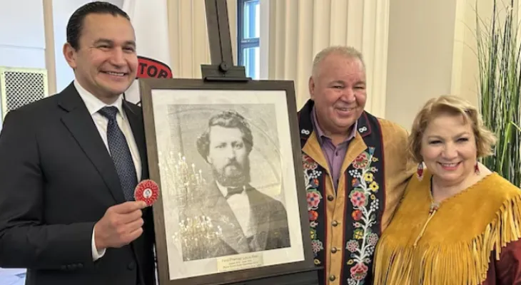 Edit attached board with a picture of Louis Riel in the Manitoba Legislature