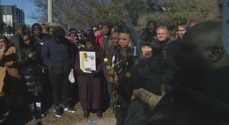 "Angel on Earth" A vigil to commemorate a father of four children killed in a shooting incident at a bus station in Toronto