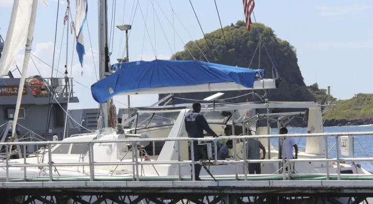 Searching for Americans on a yacht claimed to have been hijacked by escaped prisoners in the Caribbean region
