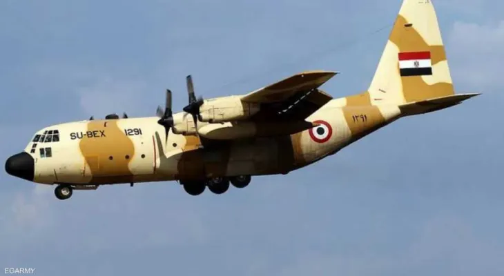 The Egyptian forces carry out an air drop operation of relief aid over Gaza