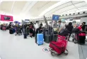 Many flights were delayed due to the strong winds that hit Toronto Pearson Airport.