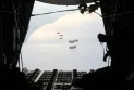 The Jordanian army carries out two airlifts of relief aid north of the Gaza Strip.
