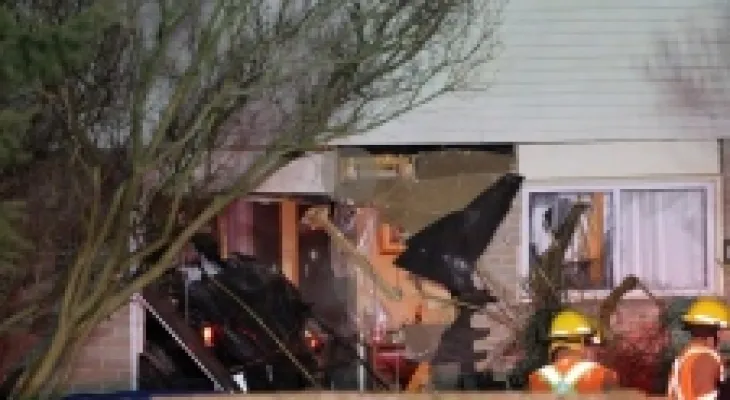 Police: Vehicle collision with a house after the driver fled the scene of a suspected bank robbery in Ajax