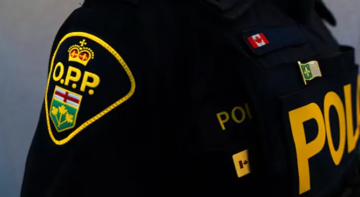 Placing a special pin on French-speaking Ontario police officers