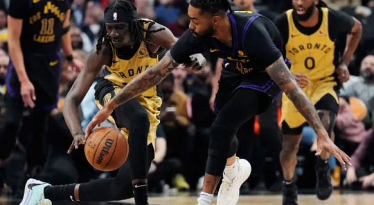 Russell leads Lakers to a 128-111 win over Raptors