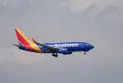 An engine cover explosion on a Southwest Airlines plane led to the cancellation of the flight and its return to Denver.