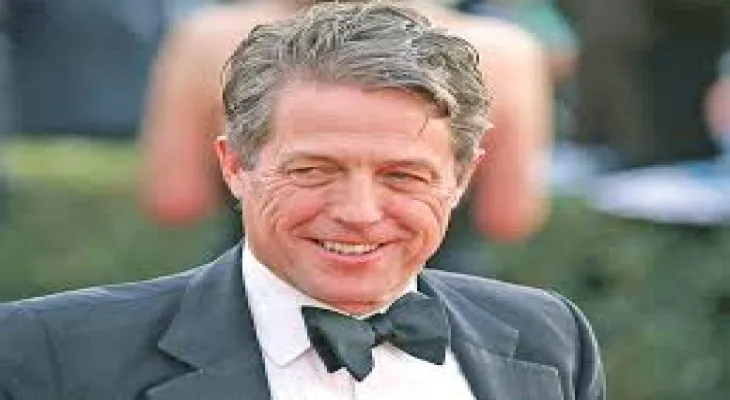 Hugh Grant receives a "huge amount" in settlement of a lawsuit against The Sun newspaper