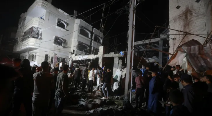 The killing of 22 Palestinians, most of them children, during Israeli airstrikes on Rafah as American lawmakers approve a new aid package.