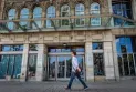 The government publishes more details about the plan to return employees to the offices by next September.
