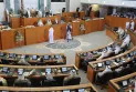 The Emir of Kuwait dissolves the National Assembly and suspends some provisions of the Constitution for a period not exceeding 4 years.