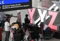 Organisateurs : Aucun remboursement pour les voyageurs ayant annulé un vol déjà annulé par la compagnie aérienne.