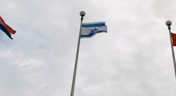 A significant police presence while the Israeli flag flies at Ottawa City Hall
