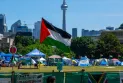 The graduation celebrations at the University of Toronto begin as pro-Palestinian protests continue in the background.