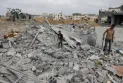 At least 11 Palestinians killed in Israeli airstrikes in central Gaza while the U.S. administration pushes a plan for a ceasefire.