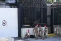 The Lebanese army identifies the shooter at the American embassy.