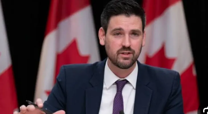 The Canadian Minister of Housing announces the launch of a $1.5 billion cooperative housing development program.