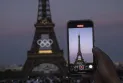 Installing the Olympic rings on the Eiffel Tower 50 days before the start of the Games in Paris