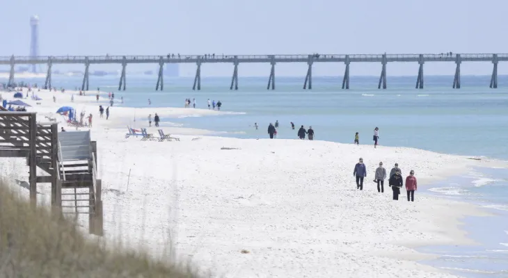 Florida warns of shark dangers along Gulf Coast beaches after 3 people were attacked.