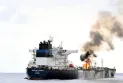 British Navy: Fire breaks out on a ship after being hit by a projectile in the Gulf of Aden