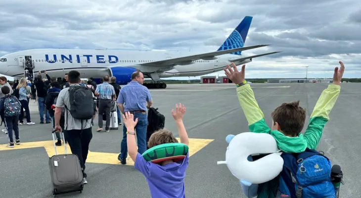 Converting the United Airlines flight heading to Paris to Newfoundland forced passengers to sleep on the seats and floors.