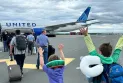 Converting the United Airlines flight heading to Paris to Newfoundland forced passengers to sleep on the seats and floors.