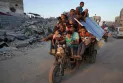 Israel orders new evacuation operations in southern Gaza, leading to the transfer of hospital patients.