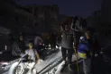 An Israeli airstrike kills an entire family after an evacuation order led to a panicked flight from southern Gaza Strip.