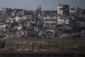 Hamas warns of the threat of ongoing escalation in ceasefire talks as Israel intensifies its incursion deeper into Gaza City.