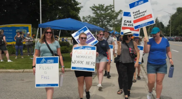 Strike of the employees of the Children's Aid Society in Ottawa for job security.