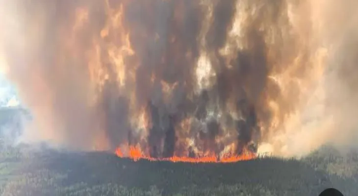 Wildfires force thousands of people to leave their homes in northeast Canada.