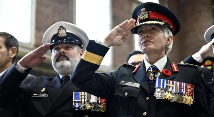 Jinni Karyanian officially assumes command of the armed forces during a ceremony at the War Museum in Ottawa.