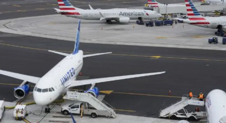 Due to the global technical malfunction.. American Airlines requires all flights to land.