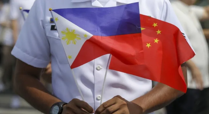 China and the Philippines reach an agreement in an attempt to halt clashes in the heavily contested shallow waters.