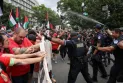 Arrestation de manifestants, membres de la famille des détenus à Gaza, lors du discours de Netanyahou au Congrès.