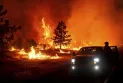 "California wildfires"..land burning the size of Los Angeles while flames rage in the western United States