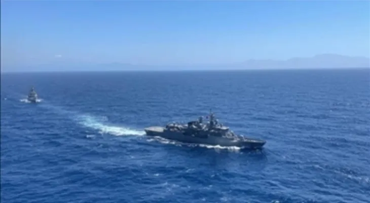 China warns Canada after a warship sailed through the Taiwan Strait.