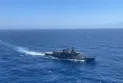 China warns Canada after a warship sailed through the Taiwan Strait.
