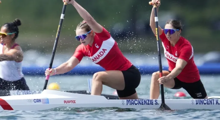 The victory of canoe racing athletes Katie Vincent and Sloan MacKenzie in winning the bronze medal.
