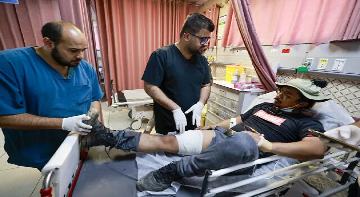 Israel indicates that its forces accidentally opened fire on an American activist in the West Bank.
