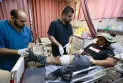 Israel indicates that its forces accidentally opened fire on an American activist in the West Bank.