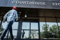 The resumption of the trial of the protesters in Coats after the conviction of the men on charges of vandalism and possession of weapons.