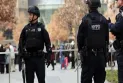 The Royal Canadian Mounted Police arrest a suspect in a shooting in Calgary.
