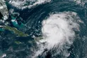 Forecasts predict Hurricane Ernesto will reach Canadian waters by Monday with uncertainty regarding its path.
