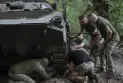 Civilians flee from Bakhmut as the Russian army advances towards the main city in eastern Ukraine.