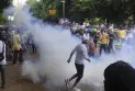 The Indian police fire tear gas and water cannons at a protest against the rape and murder of a trainee doctor.