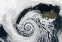 A hurricane destroys homes and brings down trees in an English town