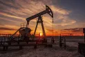 What makes Canada's economy lag behind its American counterpart?