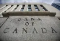 The Bank of Canada cuts interest rates by half a percentage point at once.