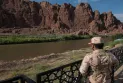 The killing of 10 border guard members in a terrorist attack southeast of Iran.